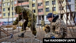 Мигранты на стройке, Москва