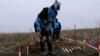 Mikolayiv, Ukraine -- A trainee of the NPA demining program at a clearance site in southern Ukraine 