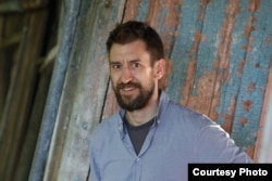 Журналіст Джошуа Кучера