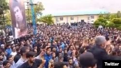 Iranians in the city of Junqan hold a rally on May 18 in honor of Jamshid Mokhtari, who was killed in an anti-government protest last year.