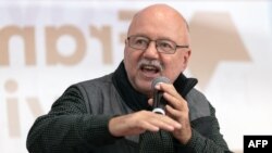 Since Russia invaded Ukraine last year, there has been a surge of interest in the West in Ukrainian artists and writers, such as Andrey Kurkov, who is pictured here speaking at an event held as part of the Frankfurt Book Fair in October.
