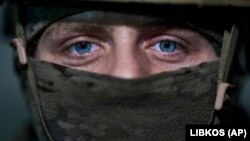 Український оборонець Бахмута. 21 лютого 2023 року. Російська армія атаку місто, починаючи з липня 2022 року