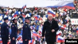 Президент Росії Володимир Путін напередодні російського Дня захисника Вітчизни на стадіоні «Лужники» в Москві, Росія, 22 лютого 2023 року
