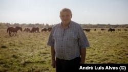 Vasyl Vlasenko’s farm is separated from Russia only by the narrow Psel River.