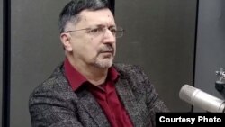 Гасан Гусейнов.