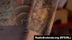 Татуювання карпа на руці Харусана