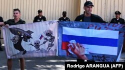 Під час акції протесту перед російським посольством в Мексиці у річницю масштабного вторгнення Росії до України. Мехіко. 24 лютого 2023 року