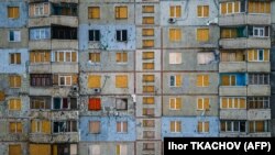 Пошкоджений обстрілом житловий будинок у районі Салтівка в Харкові, 20 лютого 2023 року