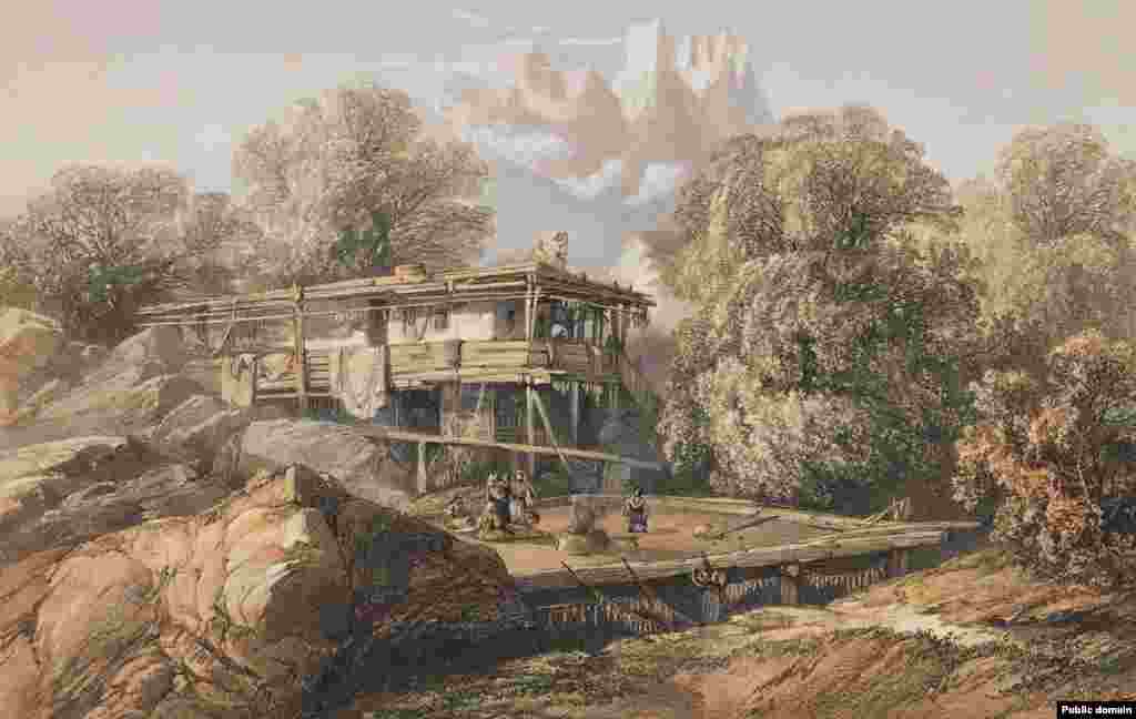 Крымскотатарский дом в селе Алупка. По словам Боссоли, такие деревенские дома часто строили на скалистых выступах, которые служили одной стеной для жилья. «Крыша плоская, обычно, когда хорошая погода, на ней собираются жители, чтобы поработать или насладиться обществом друг с другом», – писал художник  