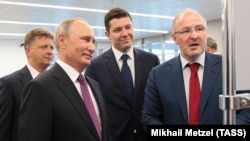 Бизнесмен Роман Троценко (справа) с Владимиром Путиным