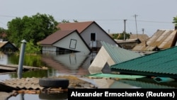 Дома в населенном пункте Голая Пристань после наводнения, вызванного разрушением плотины Каховской ГЭС