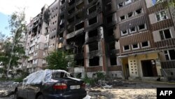 Наслідки російських обстрілів в одному з районів Харкова, 31 липня 2022 року