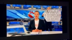 Russian TV News Hit By Anti-War Protest In Studio Russian TV News Hit By Anti-War Protest In Studio