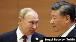 Владимир Путин и Си Цзиньпин в Самарканде в сентябре 2022 года