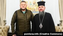 Глава ПЦУ митрополит Київський і всієї України Епіфаній і головнокомандувач ЗСУ Валерій Залужний напередодні Різдва за григоріанським календарем. Київ, 21 грудня 2022 року