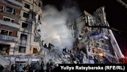 Наслідки влучення російської ракети у житловий будинок Дніпра. 14 січня 2023 року