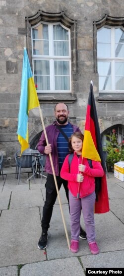 Костянтин з донькою в Німеччині