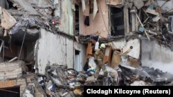 Наслідки ракетного удару армії РФ по житловому будинку в Дніпрі, 14 січня 2022 року