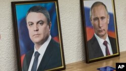 Після проведення незаконного референдуму Леонід Пасічник (ліворуч) звернувся до президента Росії «з пропозицією про прийняття «ЛНР» до складу Російської Федерації», повідомляє ОГП