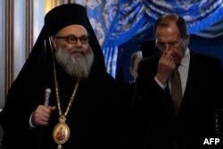Православний патріарх Антіохійський Іоанн X і міністр закордонних справ Росії Сергій Лавров. Москва, 29 січня 2014 року