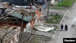 په جګړه کې د ويجاړ شوي ماريوپول ښار وران شوي کورونه - د ۲۰۲۲ز کال د اپرېل ۱۸مې انځور.