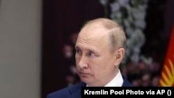 Владимир Путин