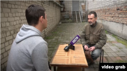 В плену Владимир Миколаенко дает интервью российскому пропагандисту в оккупированном Херсоне