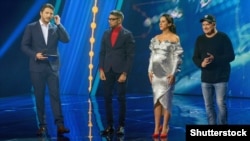 Під час першого півфіналу українського національного відбору на пісенний конкурс «Євробачення-2018». Зліва направо: ведучий – Сергій Притула, члени журі – Євген Філатов, Джамала, Андрій Данилко. Київ, 11 лютого 2018 року