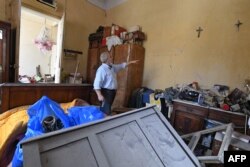 Beirut: sute de mii de oameni au rămas fără case după explozia din 4 august, 2020.