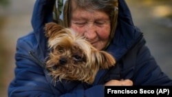 Як українці готуються до суворої зими, попри російські обстріли і знищену інфраструктуру (фотогалерея)