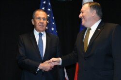 Міністр закордонних справ Росії Сергій Лавров (л) і державний секретар США Майк Помпео (п), архівне фото