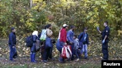 Беженцы на австрийско-германской границе