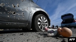 Обстріляне російськими військовими цивільне авто на Київщині, березень 2022 року