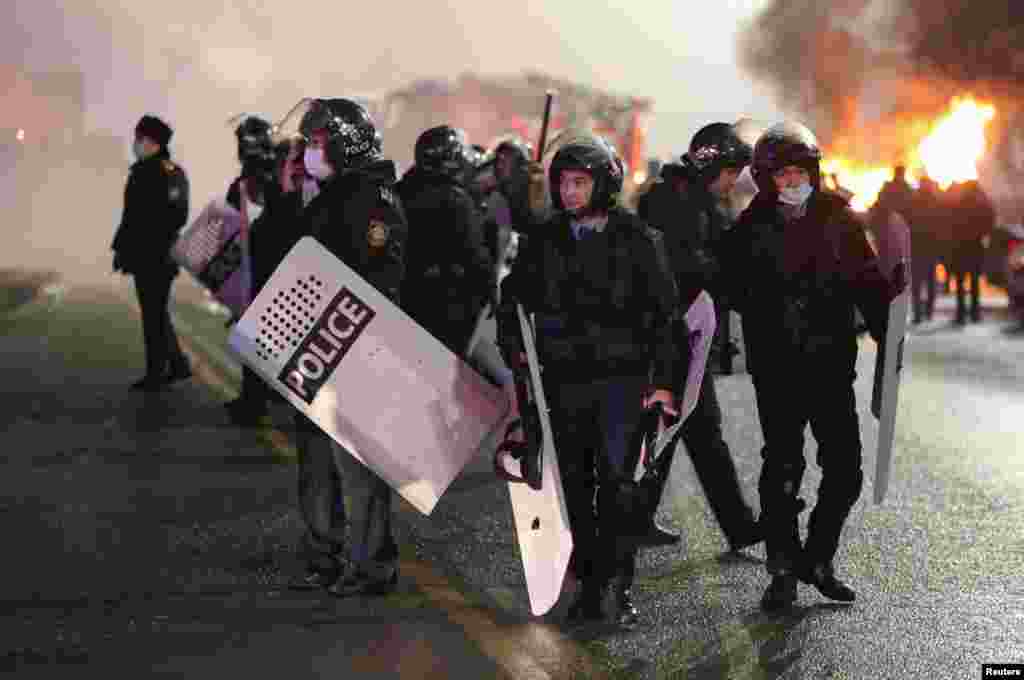 Kazakh police in Almaty on the night of January 4-5. On January 5, Kazakhstan's government resigned. Current members of the government will continue their duties until a new administration is formed. 