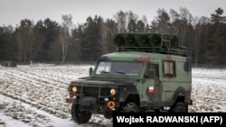 Автомобіль польських прикордонників на білорусько-польському кордоні, фото ілюстративне