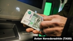 Российские финучреждения открывают все большее количество отделений и банкоматов в захваченных населенных пунктах Украины