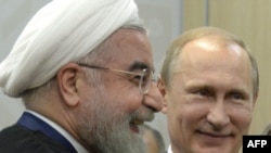 Владимир Путин и Хасан Рухани