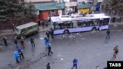 Наслідки обстрілу зупинки громадського транспорту в мікрорайоні Боссе 22 січня 2015 року