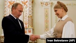 Тодішні прем'єр-міністри України і Росії, Юлія Тимошенко і Володимир Путін. Московська область, 2 жовтня 2008 року