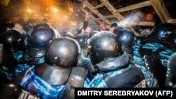 Ukrainian riot police clash with antigovernment protesters on Independence Square in Kyiv. There has been speculation in recent weeks that there is widespread discontent among Ukraine's security forces.