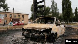 Згорілий автомобіль у Торезі. Серпень 2014 року. Ілюстраційне фото