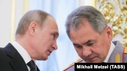 Президент Росії Володимир Путін і міністр оборони
Росії Сергій Шойгу