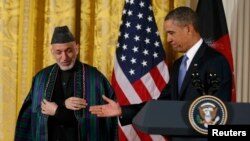 Afghan President Hamid Karzai held talks in Washington January 11 with U.S. President Barack Obama.