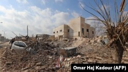 Ілюстраційне фото. Руйнування після нападу авіації урядових сил на місто Саракеб в Сирії, 29 січня 2018 року
