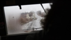 Зруйноване бойовими діями Широкино з вікна «Гамві» Зруйноване бойовими діями Широкино з вікна «Гамві»