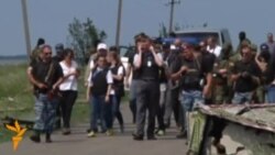 Эксперты ОБСЕ на месте крушения "Боинга" Эксперты ОБСЕ на месте крушения "Боинга"