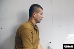 Патрульний поліцейський Володимир Петровець, який був разом із Іваном Приходьком, якого підозрюють у вбивсті дитини. Голосіївський суд Києва. 4 червня 2019 року