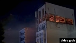 Последствия удара по городу Кум