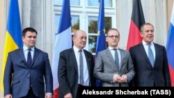 Очільники міністерств закордонних справ України, Франції, Німеччини та Росії – Павло Клімкін, Гайко Маас, Жан-Ів Ле Дріан і Сергій Лавров (зліва направо), Берлін, 11 червня 2018 року