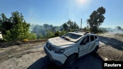 Під час евакуації постраждалих працівниками поліції сили РФ завдали повторного удару, атакувавши поліцейський автомобіль. Фото ілюстративне